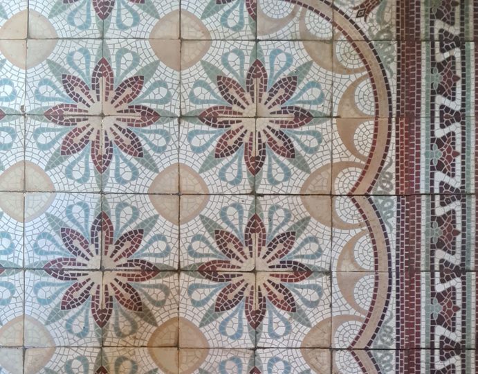 Old ceramic encaustic floor tiles before lifting