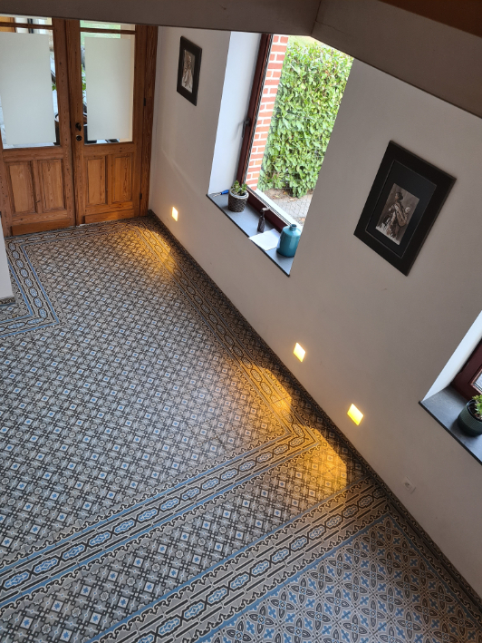 Hall way with reclaimed pattern tiles