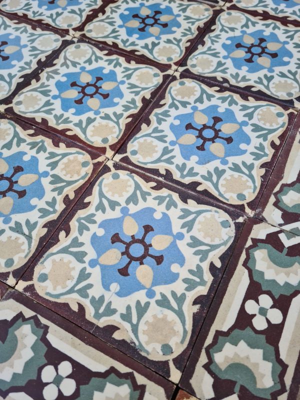 Antique ceramic tiles with flower pattern detail