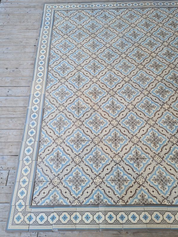 Antique ceramic encaustic tiles with matching border tiles