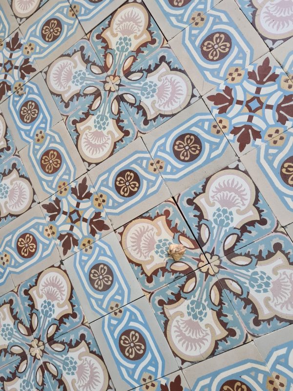 Old ceramic patterned tiles with flower motif