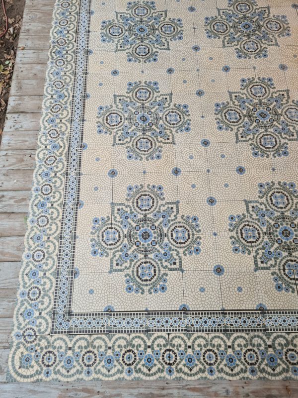 Reclaimed encaustic tiles in shades of blue and green