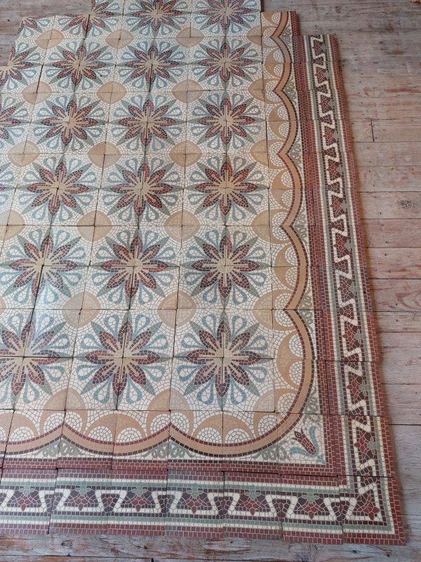 Old ceramic patterned tiles with matching border tiles