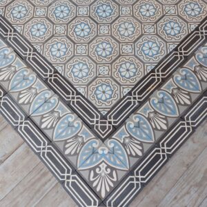 Reclaimed encaustic floor with flower motif and triple border