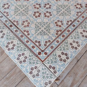 reclaimed encaustic tiles with flower pattern and matching borders