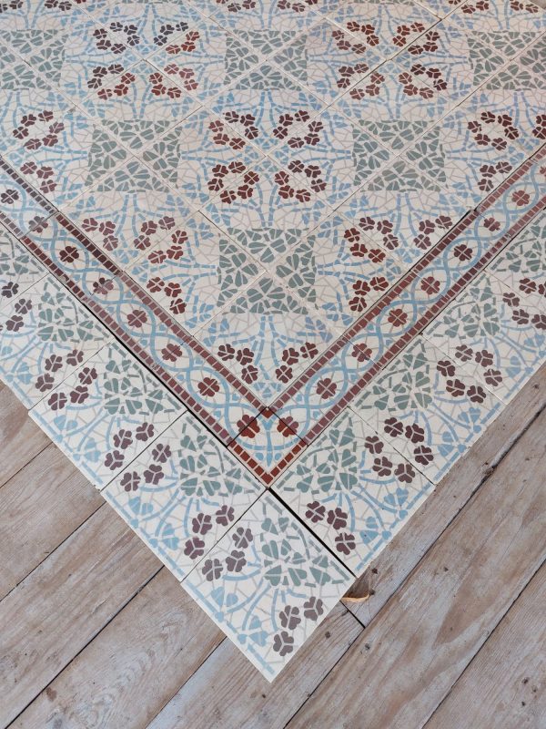 reclaimed encaustic tiles with flower pattern and matching borders