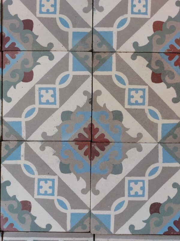 Old reclaimed encaustic tiles with floral pattern