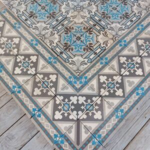Antieke keramische patroontegels in blauw- en grijstinten