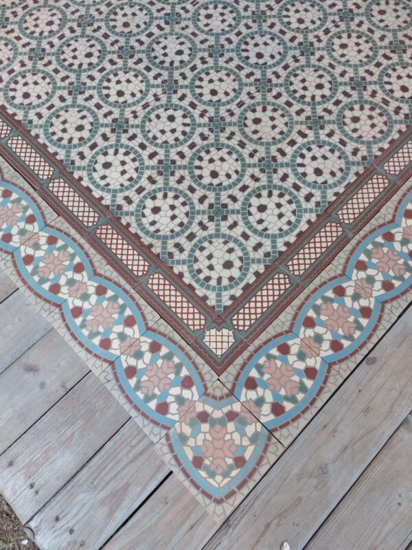 Antique encaustic floor tiles with double border