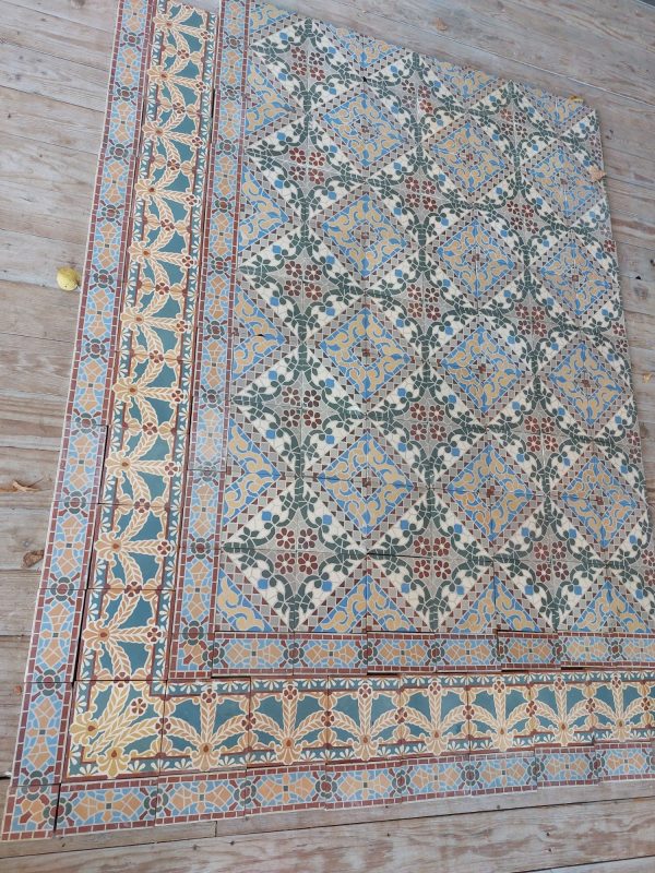 Reclaimed antique encaustic tiles with mosaic thema and flower motif and original double border