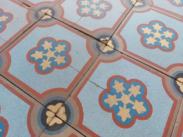 Boch Freres tiles with rich patina and single motif with dominant colors blue and red ca 1895