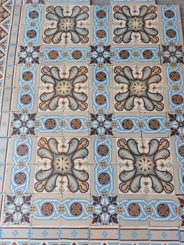 Reclaimed Encaustic Art-Nouveau floor with both flower and geometric pattern