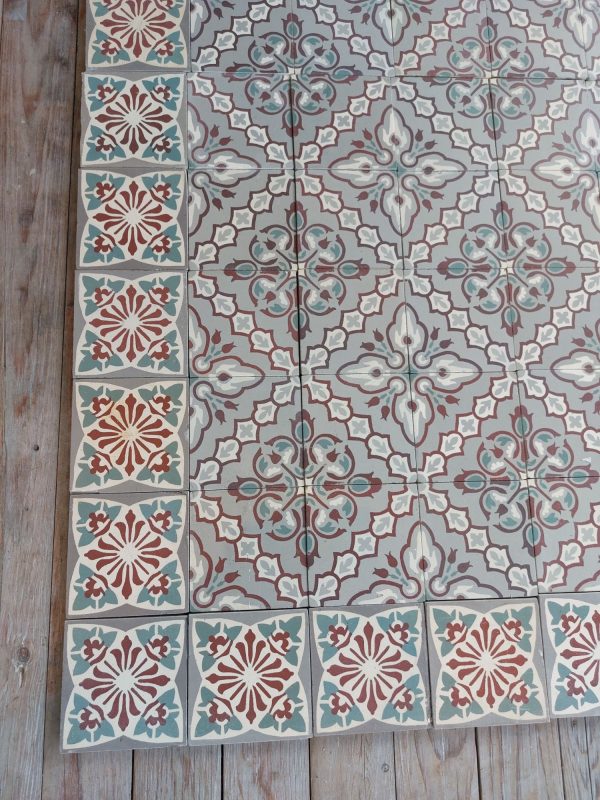 French reclaimed encaustic tiles with flower motif and matching border