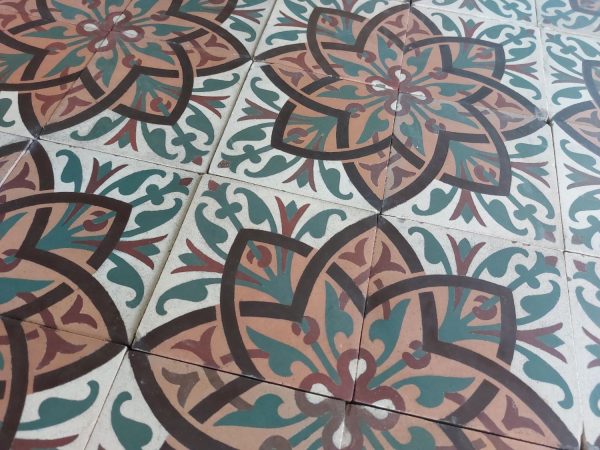 Antique ceramic patterned tiles with flower motif