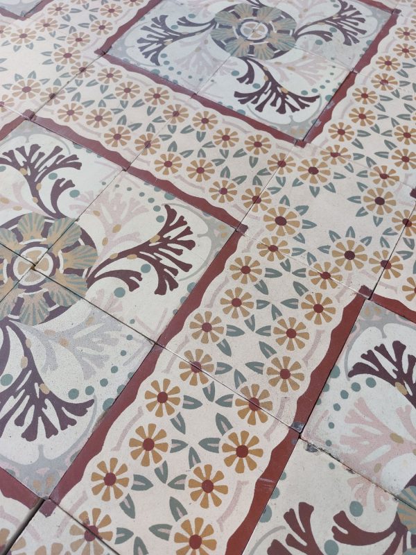Rare encaustic reclaimed Art-Nouveau floor tiles with a detailed flower pattern