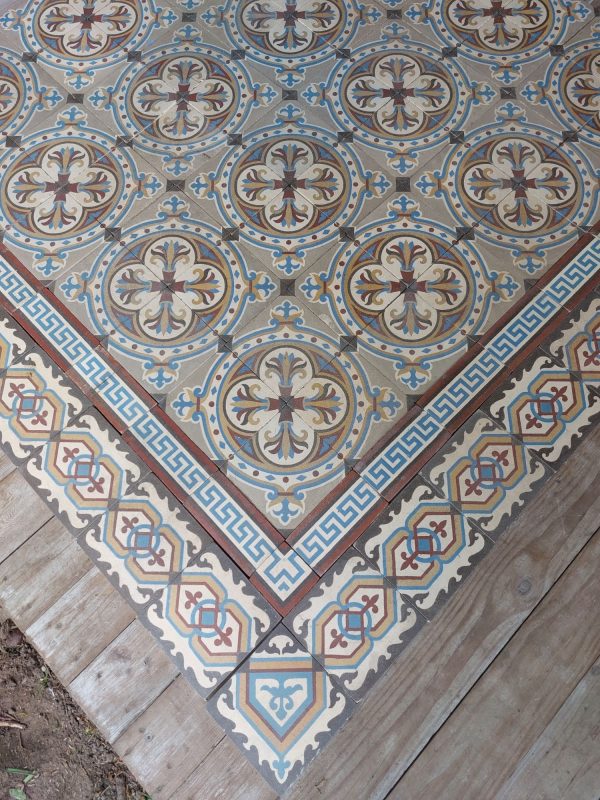Reclaimed encaustic floor with original border tiles