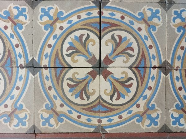 Old tiles with a circular motif and a bold flower theme