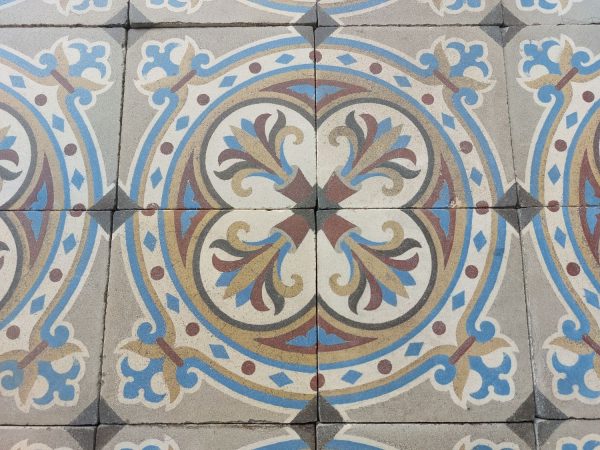 Antique tiles with a circular pattern and a bold flower theme