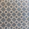 Encausted hand made antique tiles in a cool color palette with blue, white and gold as dominant colors