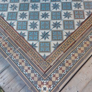 Antique reclaimed tiles with star pattern and original double border ca 1895