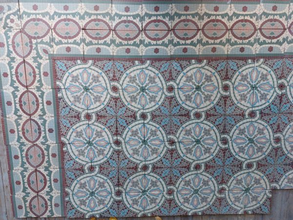 Reclaimed encaustic mosaic floor tiles from the 1920’s with matching borders