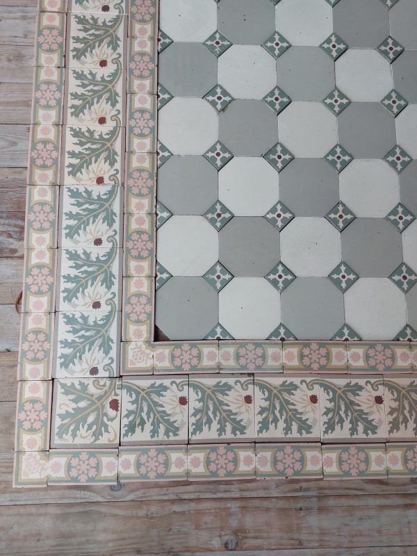 Antique octagon ceramic floor tiles with cabochons and border tiles with thistle pattern.