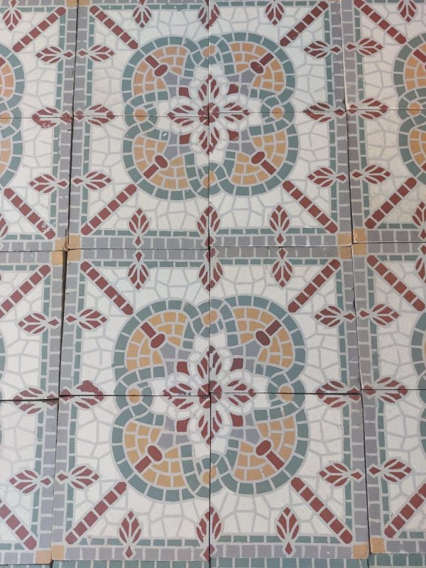 Antique false mosaic floor with white and red as dominant colors