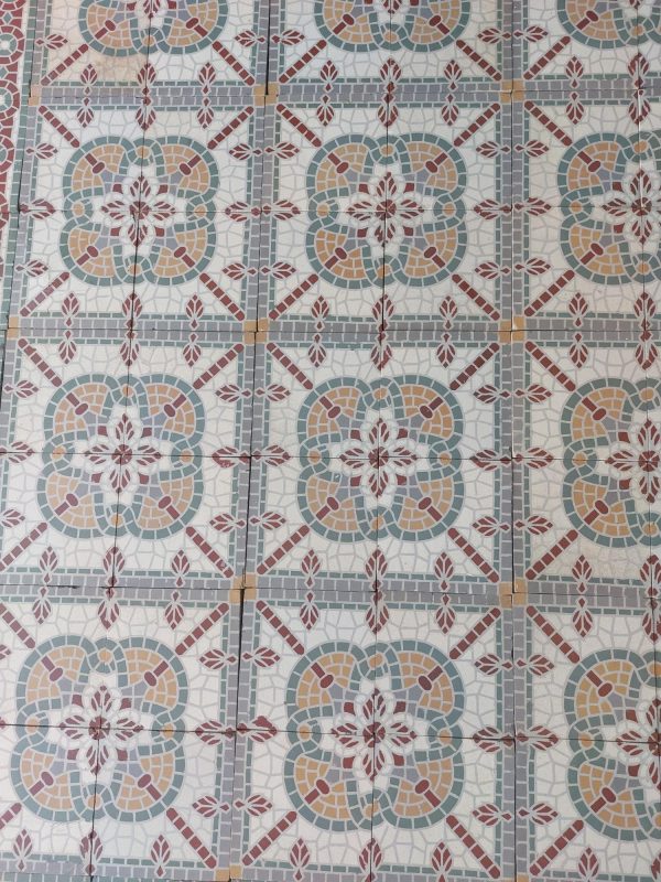 Old false mosaic floor with white and red as dominant colors ca 1920's