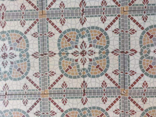 Old false mosaic tiles with white and red as dominant colors ca 1920's