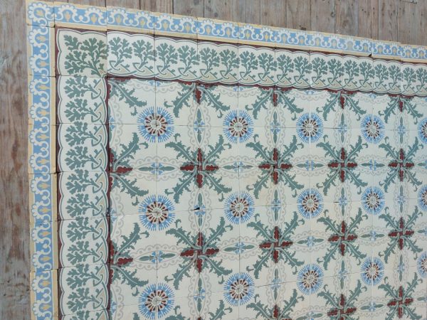 Art Nouveau tiles in a theme of thistle and cornflowers with double border