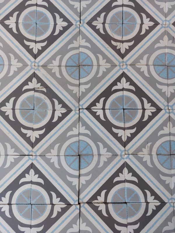 Old reclaimed Belgian tiles with geometric pattern