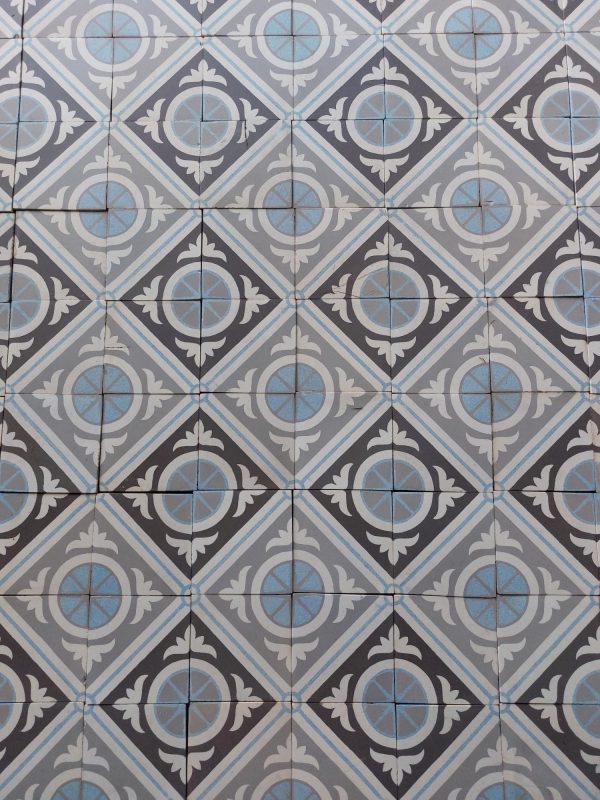 old ceramic tiles with blue and grey as dominant colors