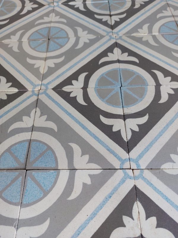 Antique ceramic tiles with blue and grey as dominant colors