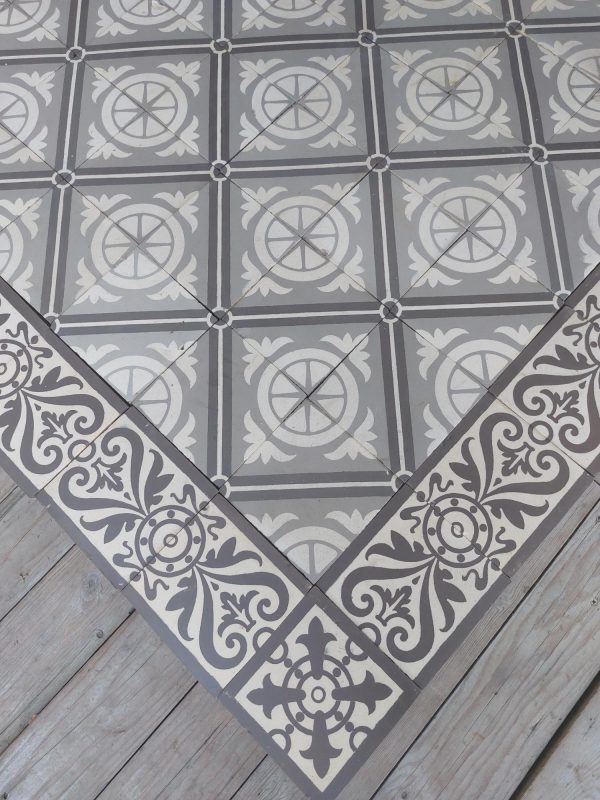 Antique reclaimed ceramic floor with matching borders