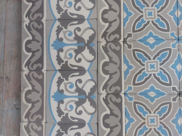 Antique ceramic floor with triple border in shades grey and blue