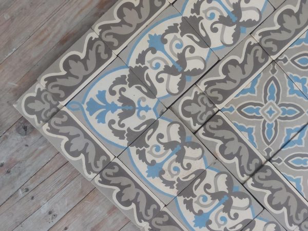 Antique ceramic floor with triple border in shades grey and blue