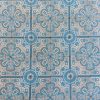 Antique ceramic Art-Nouveau tiles in shades of blue and grey