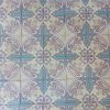 Reclaimed encaustic floor tiles with pink and blue