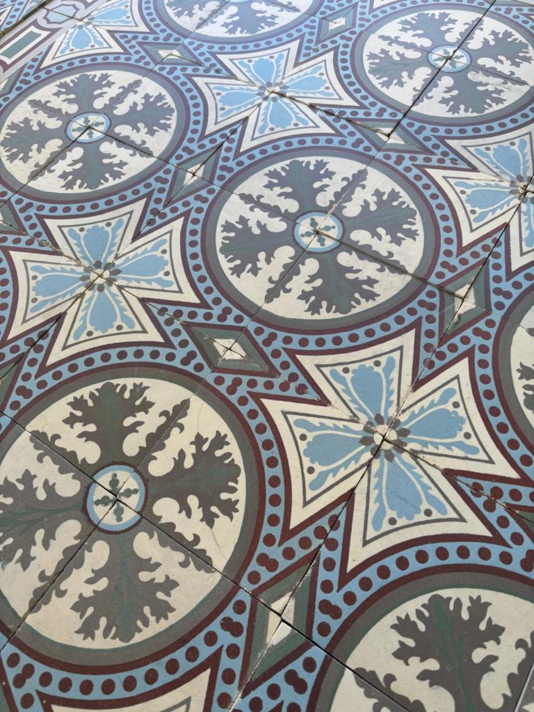 Reclaimed Art-Nouveau floor with floral motif