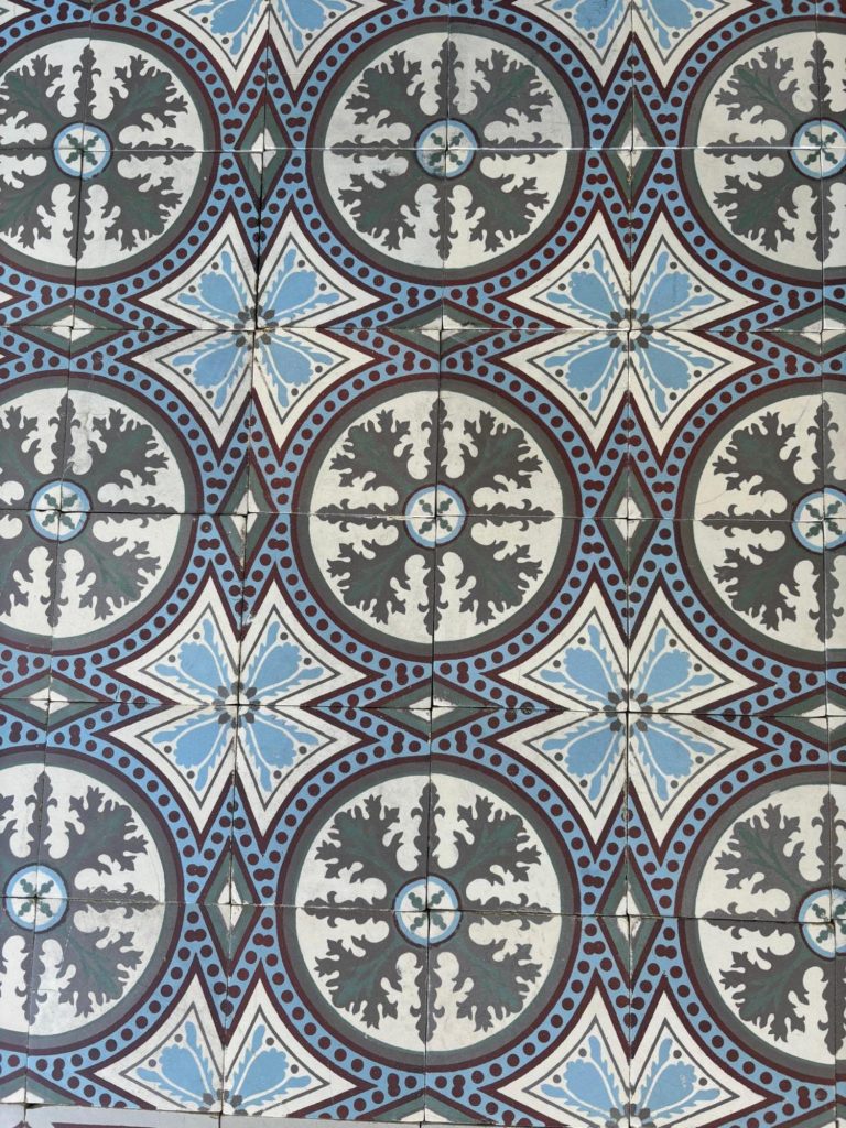 Reclaimed Art-Nouveau floor with floral pattern