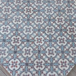 Antique floor with mosaik flower pattern